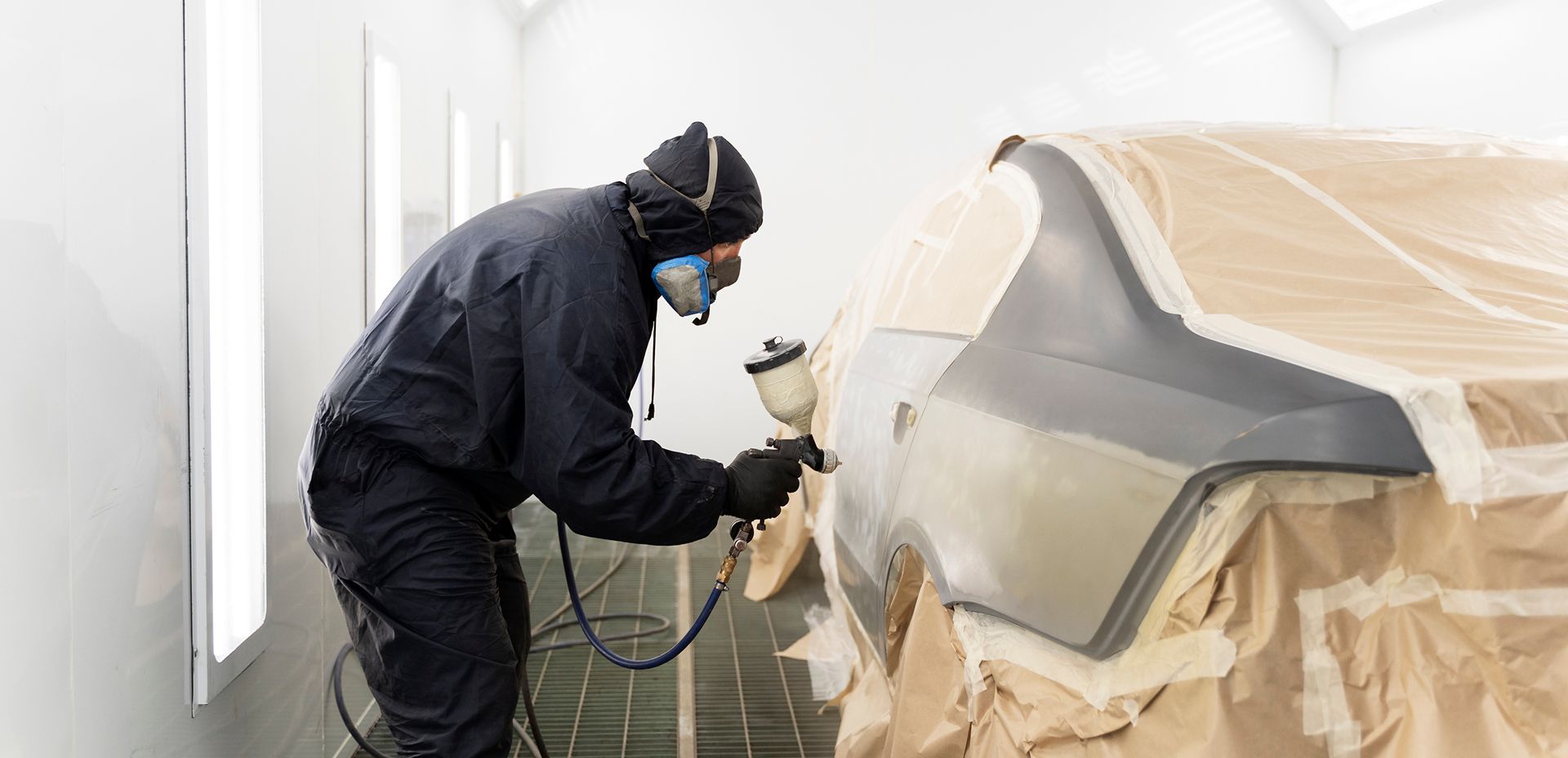 service-worker-painting-car-in-auto-service 1.jpg